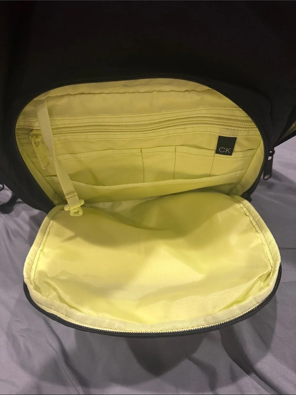 Calvin Klein Men's Black Backpack with Subtle Yellow Accents